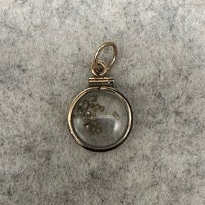 Elegant 14k Gold Pendant with 24k gold nuggets inside